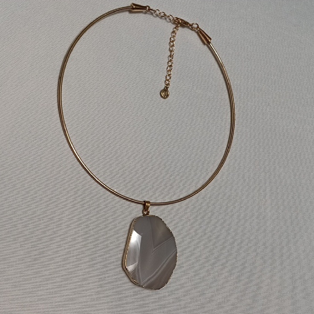 Elegant Gold and Silver Pendant Necklace